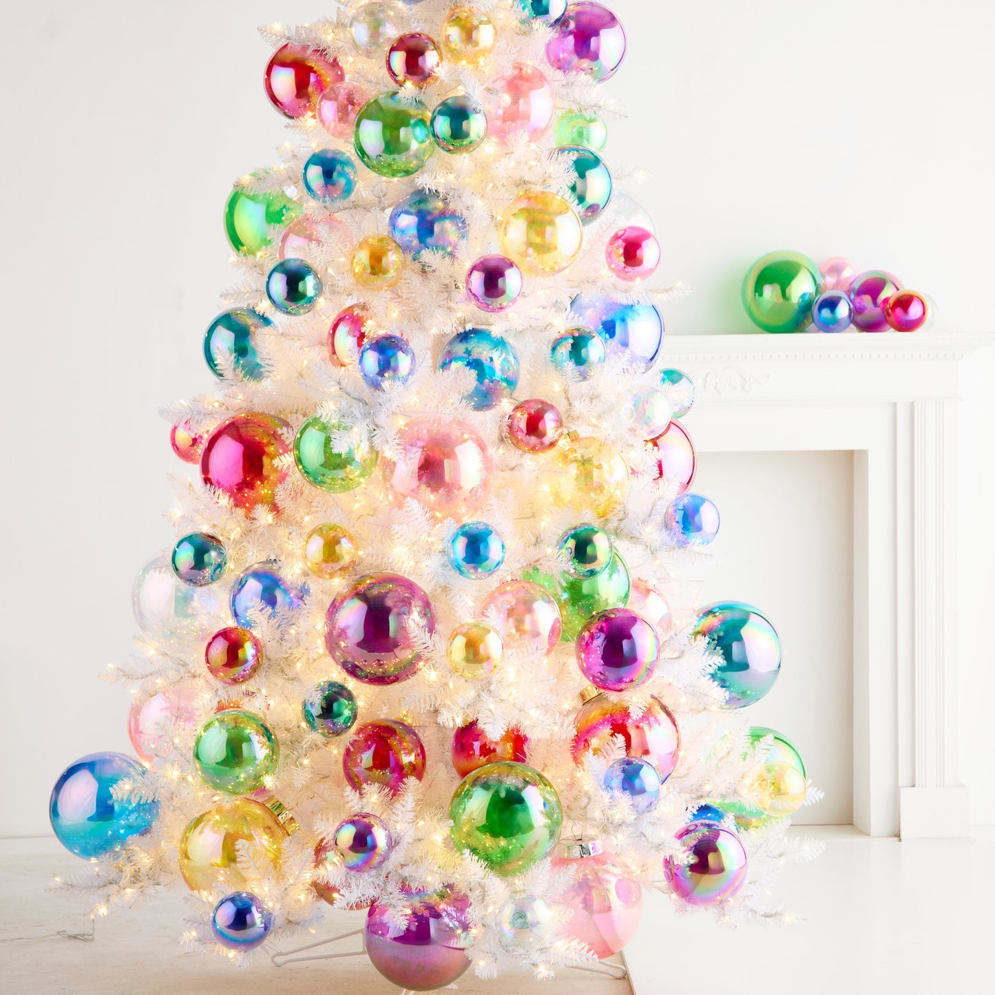 Decorative Christmas tree with colorful ornaments on a white background