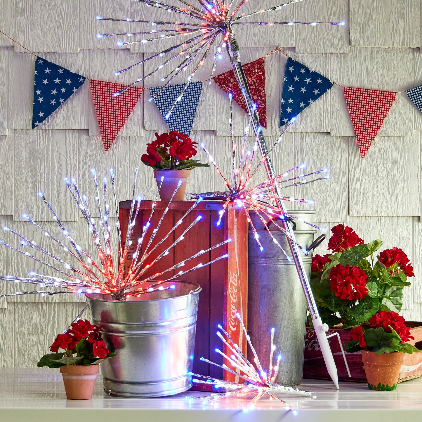 RAZ Imports 14" Silver LED Lighted Patriotic Fourth of July Firework Starburst with Red, White, and Blue Lights