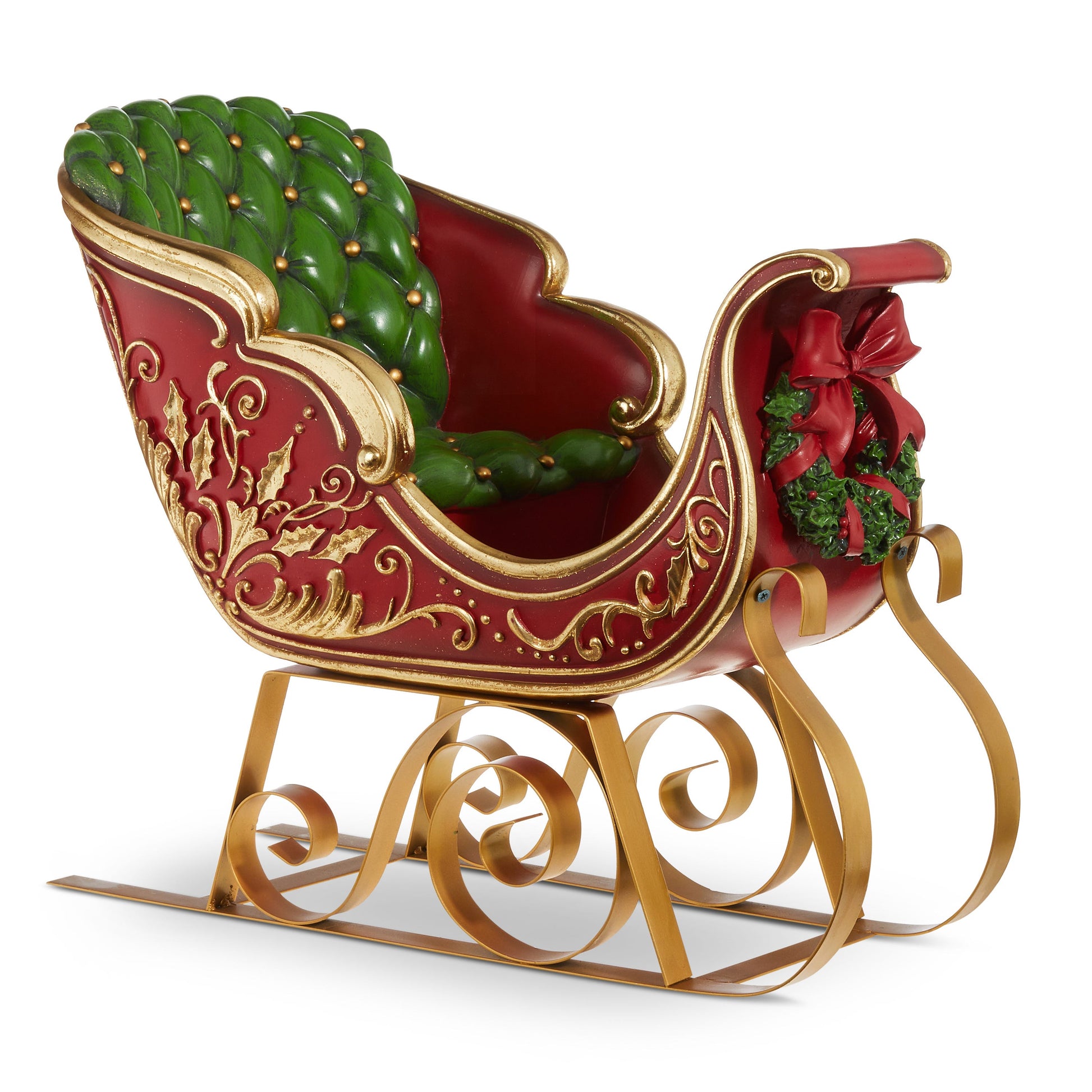 Decorative Christmas sleigh with gold and red design on a white background