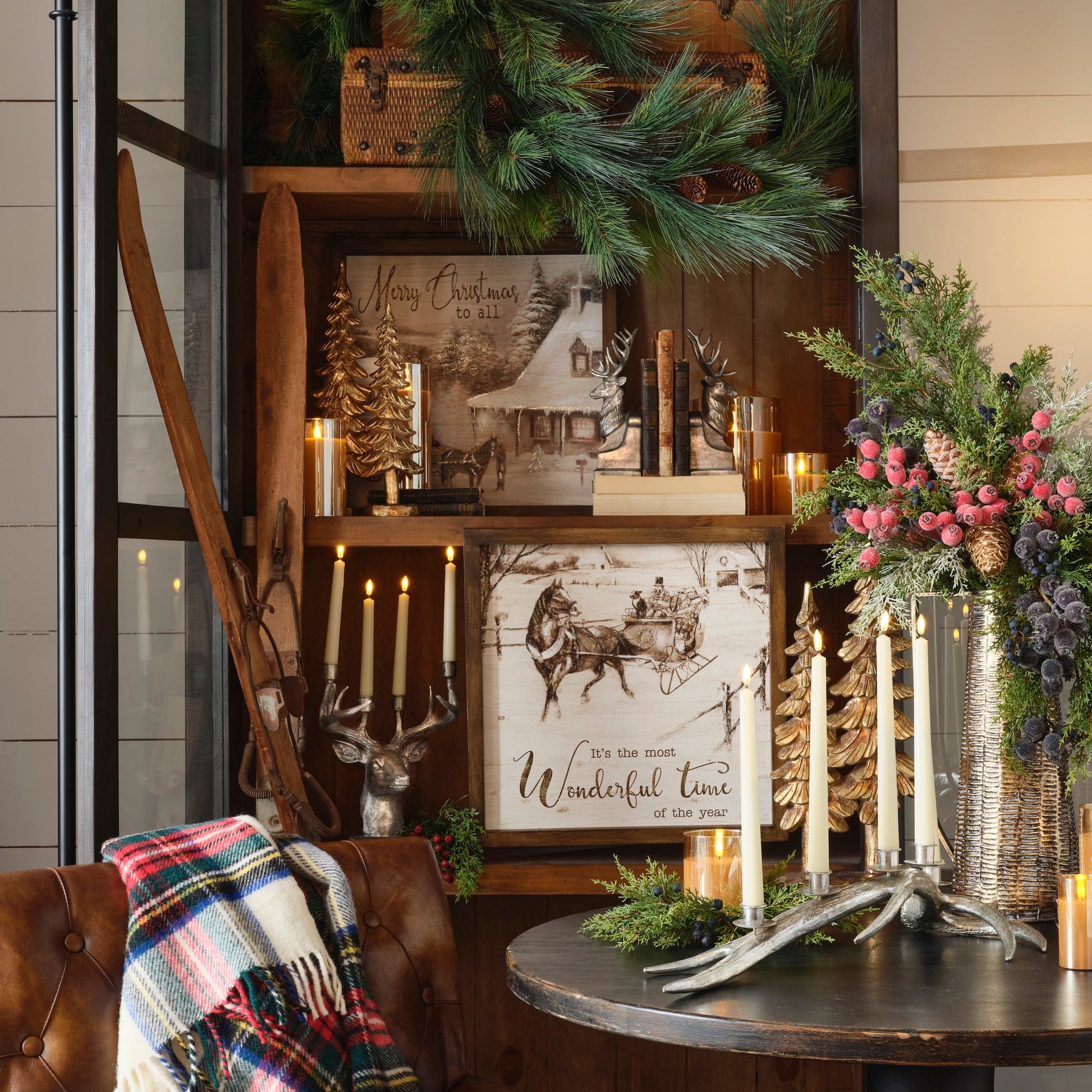 Decorative interior setting with a wooden shelf, candles, and festive decorations.