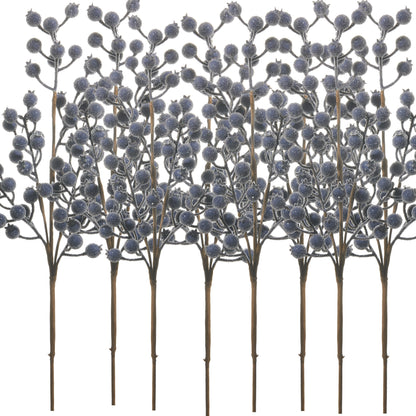 Set of decorative branches with blue berries on a white background