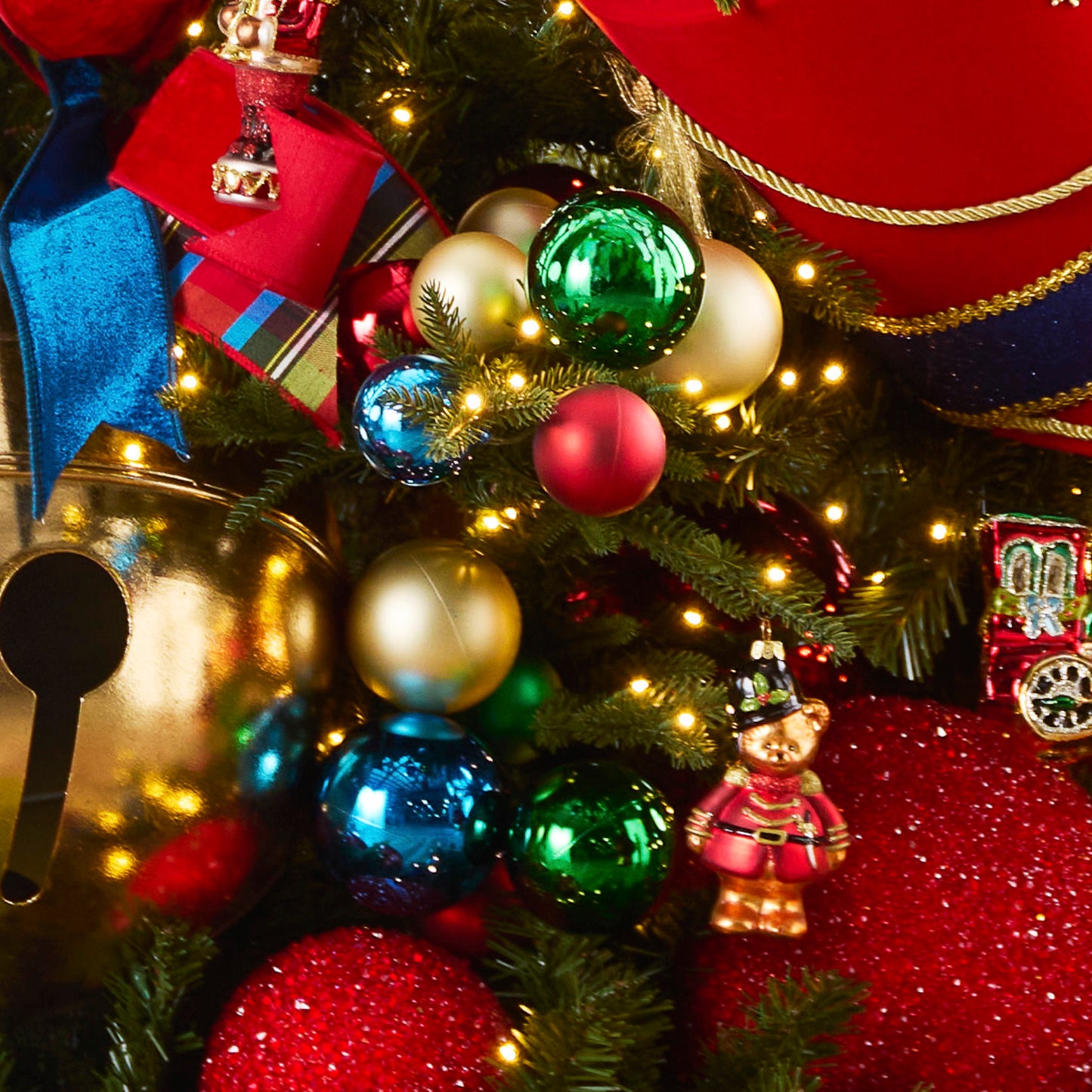 RAZ Imports 26" Nutcracker Red, Green, Gold and Blue Ball Ornament Christmas Tree Spray