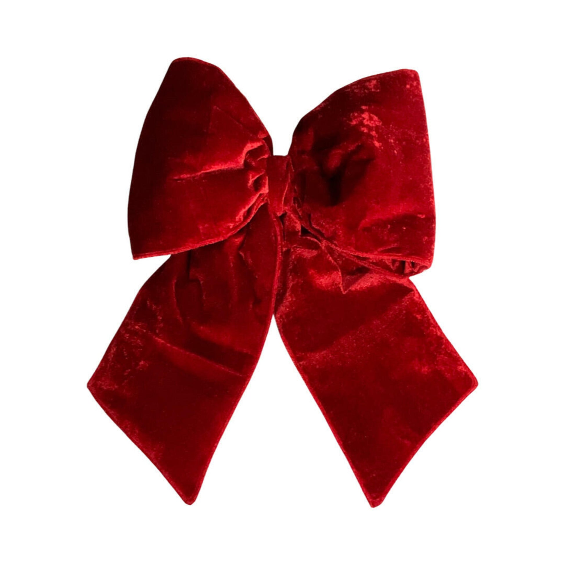 Red velvet bow on a white background