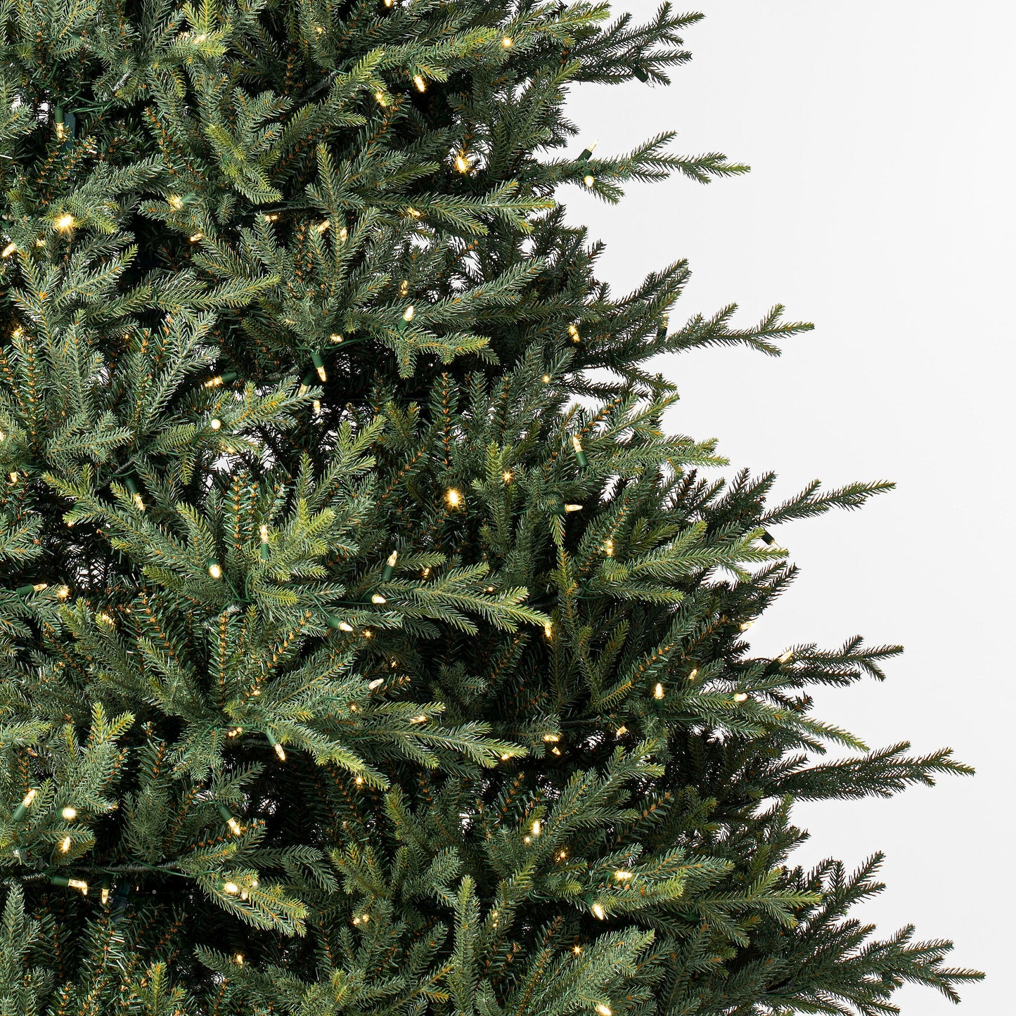 Itasca Fraser Fir 9.5' Artificial Christmas Tree with Warm White LED Clear Dura-lit Mini Lights